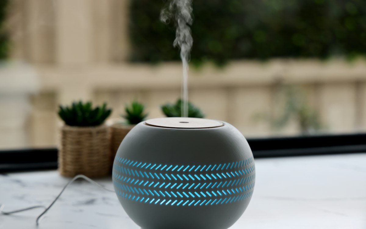 A portable Bluetooth speaker sitting on a table