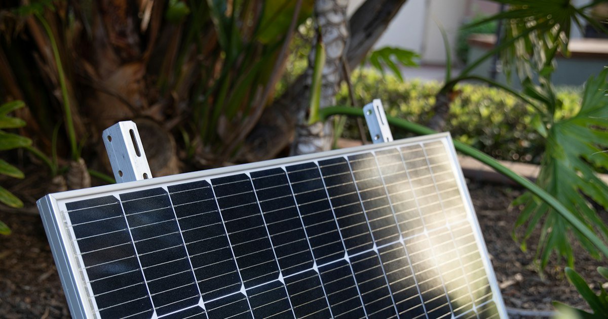 Solar panel for portable power station use angled on the ground in direct sun