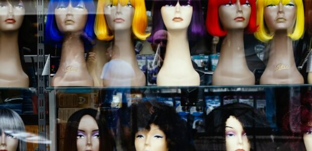 Lace front vs full lace wig styles displayed side by side on stands