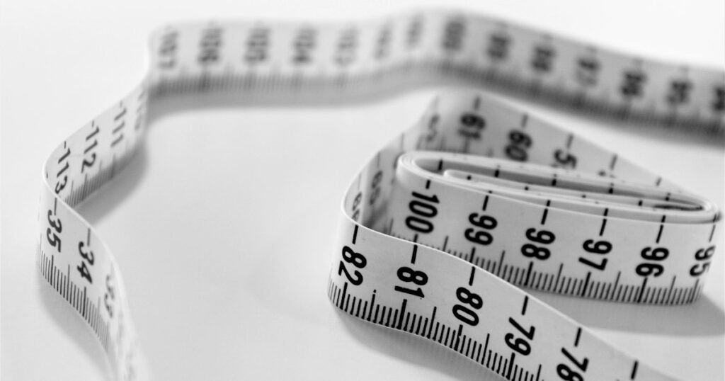 Measure yourself for a dress – tape measure close-up