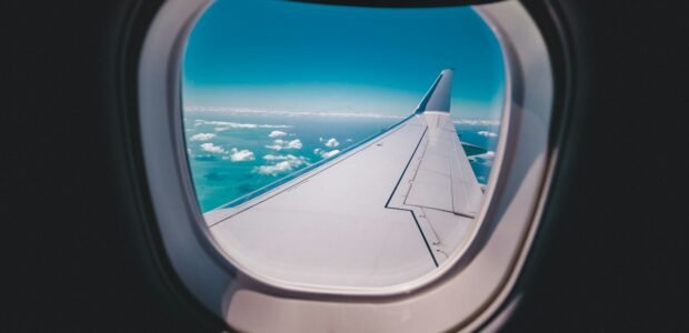 Qatar Airways Privilege Club – airplane wing seen from the window