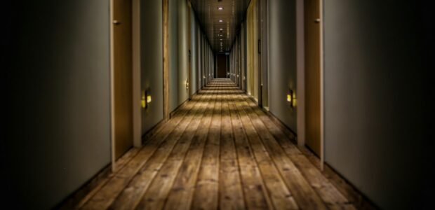 Hallway and front door of a building, relevant to a smart lock buying guide