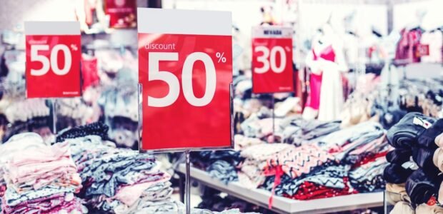 Coupon categories – sale sign in a shopping mall