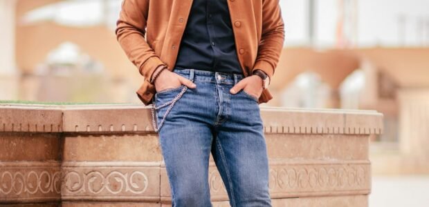 Man wearing a casual tan jacket and jeans, the kind of menswear a COOFANDY Black Friday sale discounts