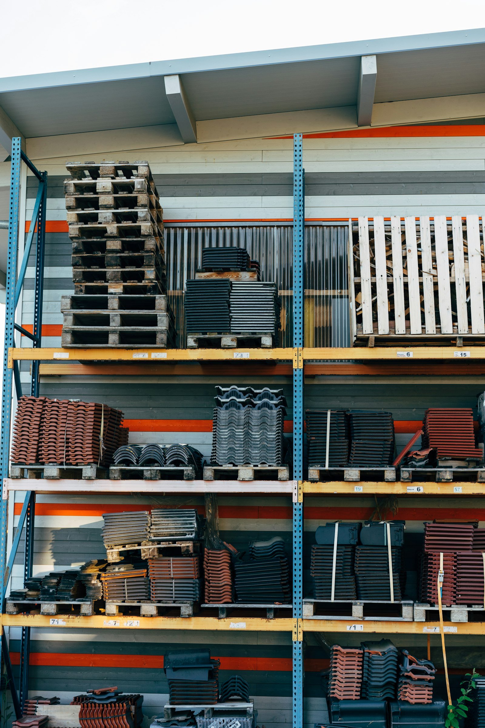 Wooden shelving unit filled with organized household items, the kind of storage furniture a GARVEE buying guide covers