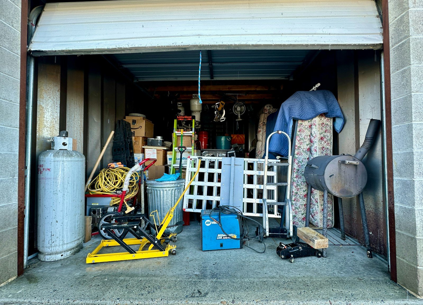Garage shelving holding tools and storage boxes, an example of the garage storage furniture category