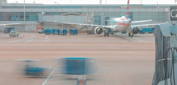is lastminute legit - airplane ready for flight at an airport representing lastminute.com travel bookings