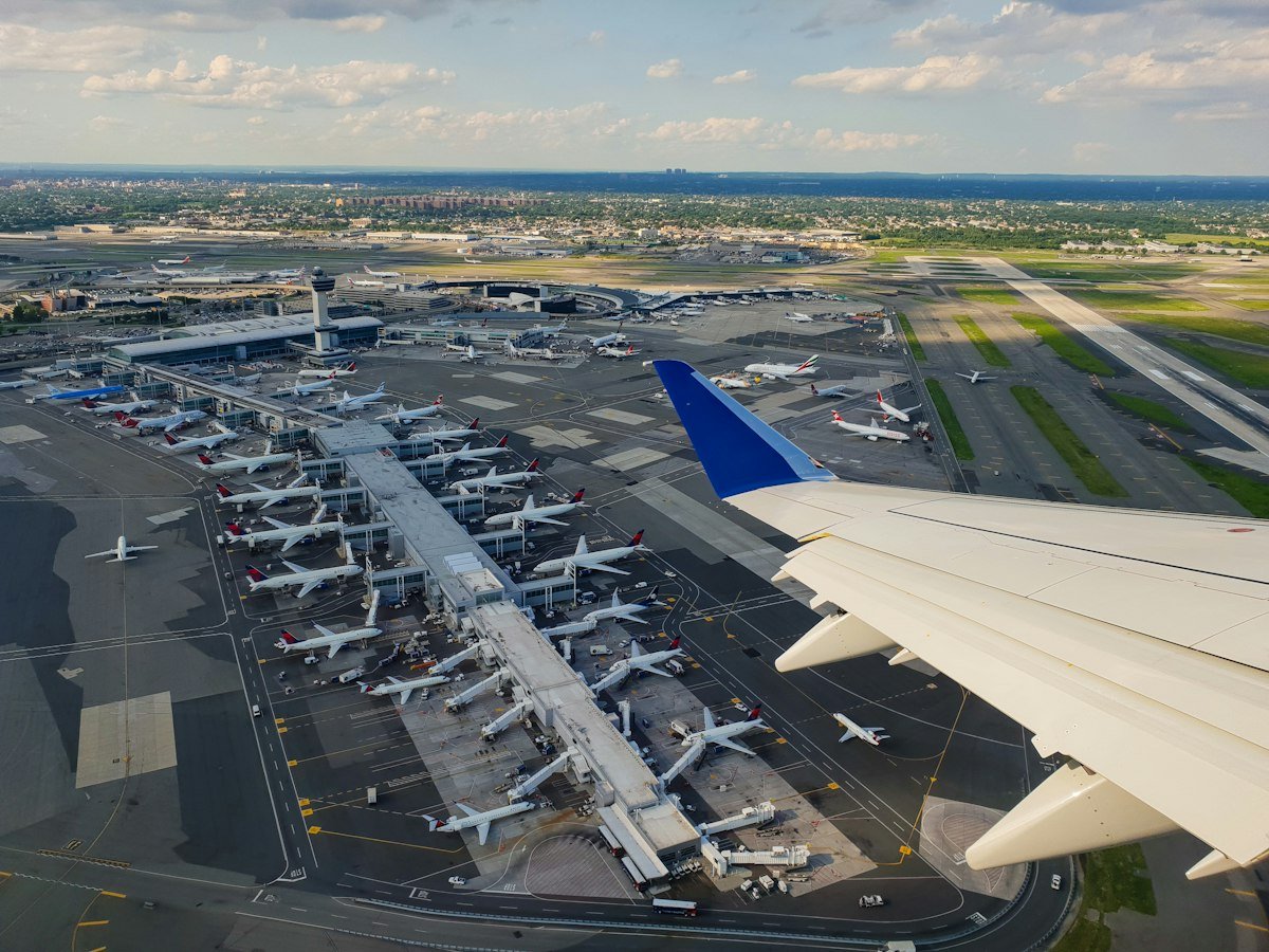 Is lastminute.com legit? Aerial view of an airport runway representing flights booked through the OTA