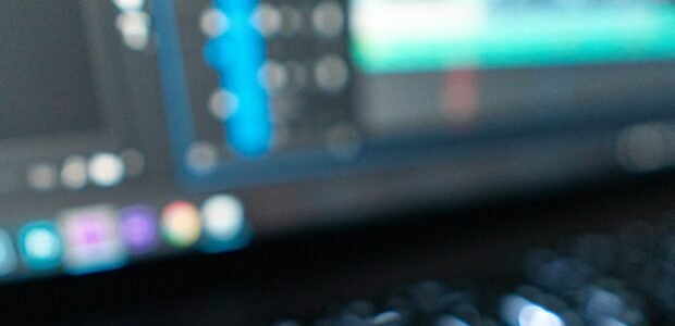 is wondershare legit - black laptop computer representing Wondershare software like Filmora and PDFelement